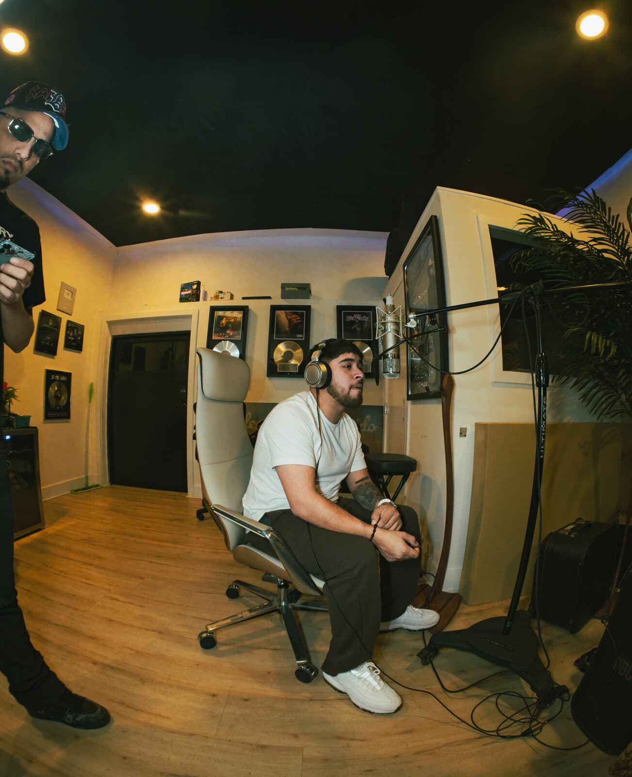 Recording artist at the microphone during a studio session, captured by SoCal Shooter